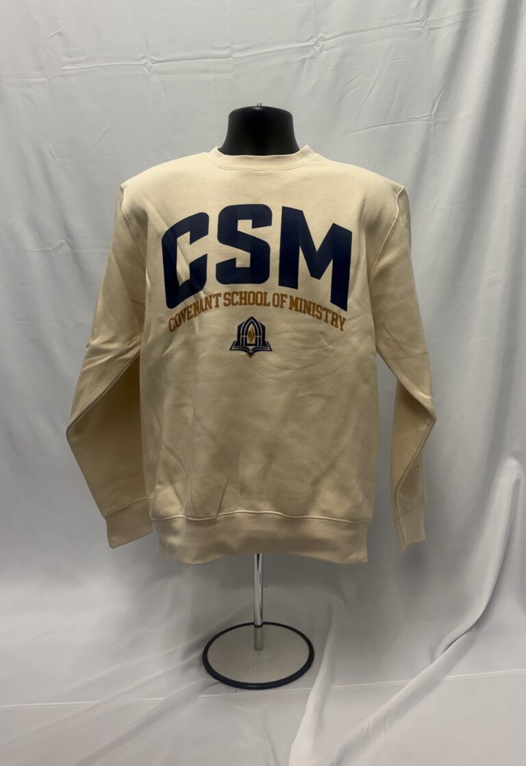 Tan cream crewneck sweatshirt featuring a bold navy and gold screen-printed back logo for Covenant School of Ministry.